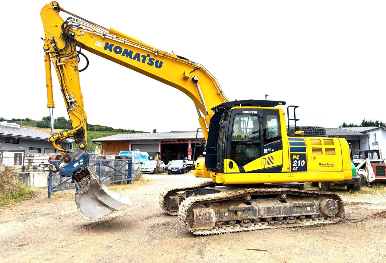 Komatsu PC210LC-11E0 - Lánctalpas kotró: 1 kép. Komatsu PC210LC-11E0 - Lánctalpas kotró: 1 kép.