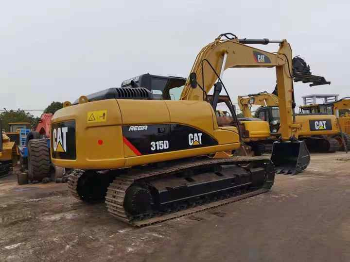 15tons Excavator Used Caterpillar CAT315D 315D2GC HydraulicCrawler Secondhand Digger Machine - Lánctalpas kotró: 4 kép. 15tons Excavator Used Caterpillar CAT315D 315D2GC HydraulicCrawler Secondhand Digger Machine - Lánctalpas kotró: 4 kép.