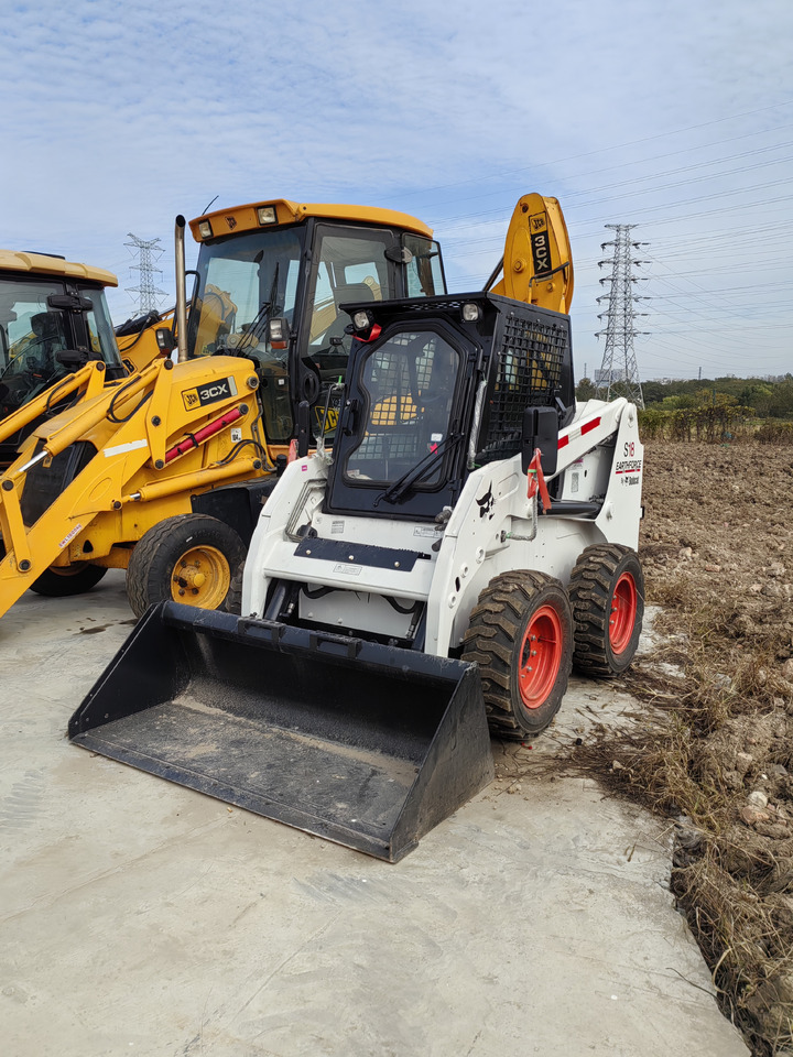 BOBCAT used second-hand good condition Bobcat S18 - Mini homlokrakodó: 2 kép. BOBCAT used second-hand good condition Bobcat S18 - Mini homlokrakodó: 2 kép.