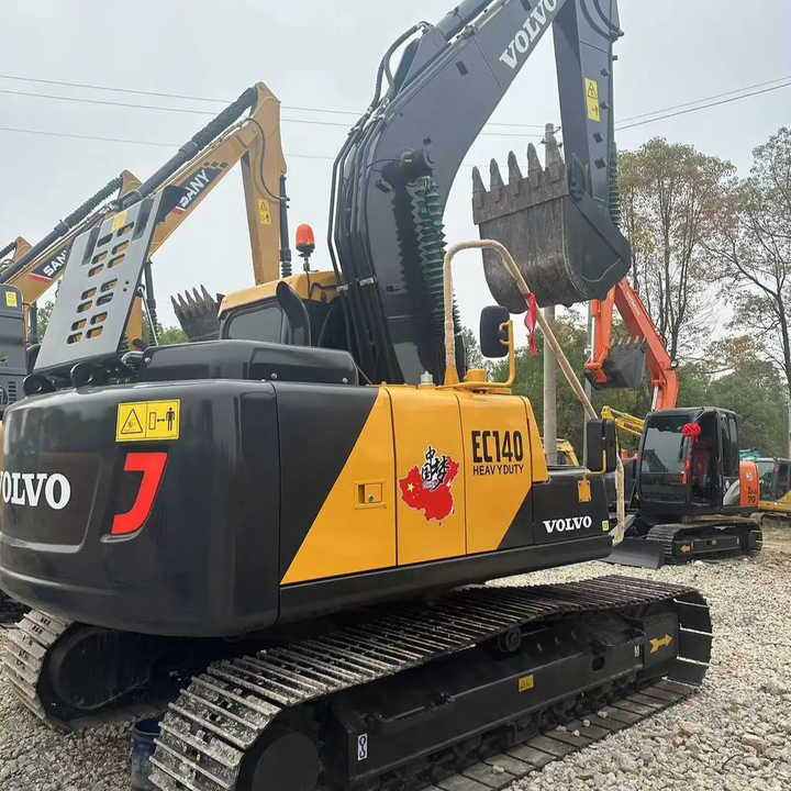 China Brand Used VOLVO EC140 Mini Excavator 6ton Crawler Earth Digger Machine for Sale - Lánctalpas kotró: 1 kép. China Brand Used VOLVO EC140 Mini Excavator 6ton Crawler Earth Digger Machine for Sale - Lánctalpas kotró: 1 kép.
