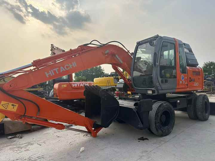 Hot Sale! Used Hitachi ZX130 Wheel Excavator |Excellent Condition| Best Price | Perfect for Construction & Road Projects - Kotrógép: 5 kép. Hot Sale! Used Hitachi ZX130 Wheel Excavator |Excellent Condition| Best Price | Perfect for Construction & Road Projects - Kotrógép: 5 kép.