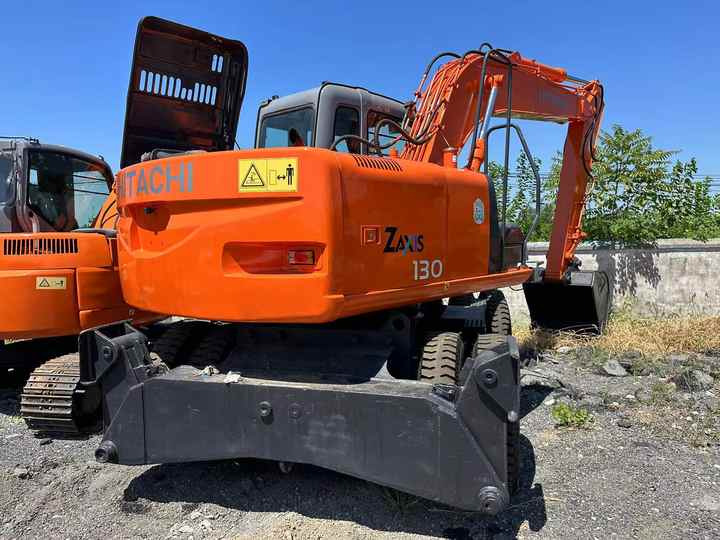 Hot Sale! Used Hitachi ZX130 Wheel Excavator |Excellent Condition| Best Price | Perfect for Construction & Road Projects - Kotrógép: 4 kép. Hot Sale! Used Hitachi ZX130 Wheel Excavator |Excellent Condition| Best Price | Perfect for Construction & Road Projects - Kotrógép: 4 kép.