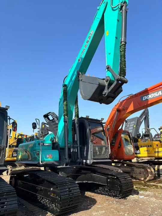 New Arrival Kobelco Sk200D 20tons Crawler Excavator for Sale 90% Brand New Kobelco Sk140 200 350 Digger in Stock - Kotrógép: 2 kép. New Arrival Kobelco Sk200D 20tons Crawler Excavator for Sale 90% Brand New Kobelco Sk140 200 350 Digger in Stock - Kotrógép: 2 kép.