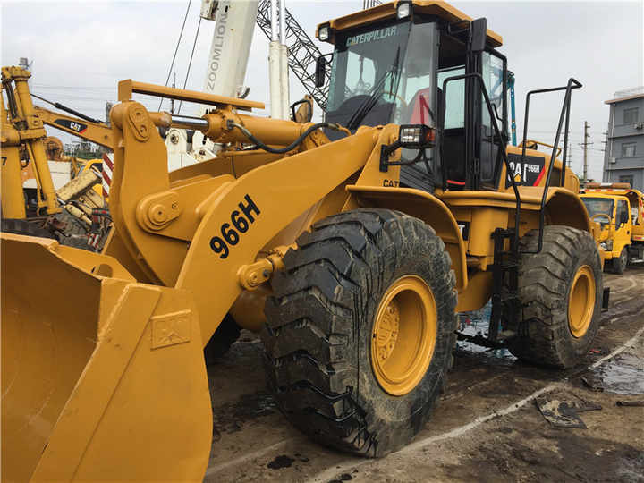 New Arrival USA Cat Machinery 966H Wheel Loader CAT 950 966 980 Wheel Loader Caterpillar Machine CAT 966H Used Wheel Loader - Gumikerekes homlokrakodó: 4 kép. New Arrival USA Cat Machinery 966H Wheel Loader CAT 950 966 980 Wheel Loader Caterpillar Machine CAT 966H Used Wheel Loader - Gumikerekes homlokrakodó: 4 kép.