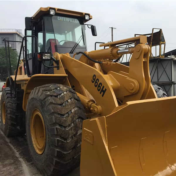 New Arrival USA Cat Machinery 966H Wheel Loader CAT 950 966 980 Wheel Loader Caterpillar Machine CAT 966H Used Wheel Loader - Gumikerekes homlokrakodó: 1 kép. New Arrival USA Cat Machinery 966H Wheel Loader CAT 950 966 980 Wheel Loader Caterpillar Machine CAT 966H Used Wheel Loader - Gumikerekes homlokrakodó: 1 kép.