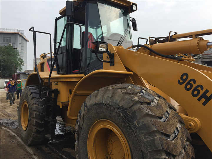 New Arrival USA Cat Machinery 966H Wheel Loader CAT 950 966 980 Wheel Loader Caterpillar Machine CAT 966H Used Wheel Loader - Gumikerekes homlokrakodó: 5 kép. New Arrival USA Cat Machinery 966H Wheel Loader CAT 950 966 980 Wheel Loader Caterpillar Machine CAT 966H Used Wheel Loader - Gumikerekes homlokrakodó: 5 kép.