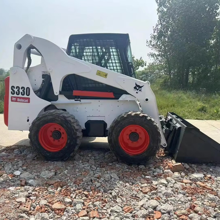 The Best Selling Used Construction Machinery in USA Bobcat S330 Loader High Quality and Cheap Price - Mini homlokrakodó: 1 kép. The Best Selling Used Construction Machinery in USA Bobcat S330 Loader High Quality and Cheap Price - Mini homlokrakodó: 1 kép.
