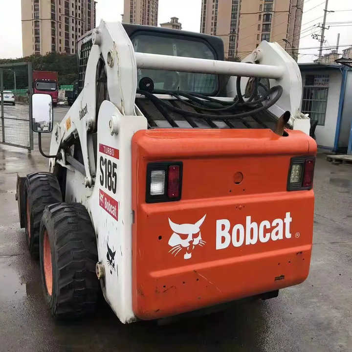 Used Bob Cat Bob Cat S185 Used Mini Skid Steer Wheel Loader Multifunctional Track Loaders Bobcat - Gumikerekes homlokrakodó: 1 kép. Used Bob Cat Bob Cat S185 Used Mini Skid Steer Wheel Loader Multifunctional Track Loaders Bobcat - Gumikerekes homlokrakodó: 1 kép.