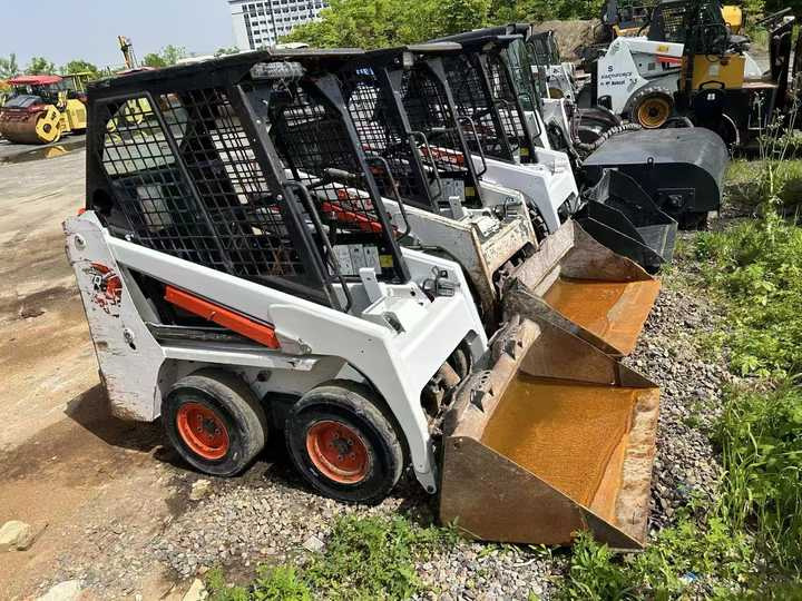 Used Bobcat S70 Skid Teer in Stock Good Condition bobcat S70 S160 185 300 330 Skid Steer for Sale - Mini homlokrakodó: 5 kép. Used Bobcat S70 Skid Teer in Stock Good Condition bobcat S70 S160 185 300 330 Skid Steer for Sale - Mini homlokrakodó: 5 kép.