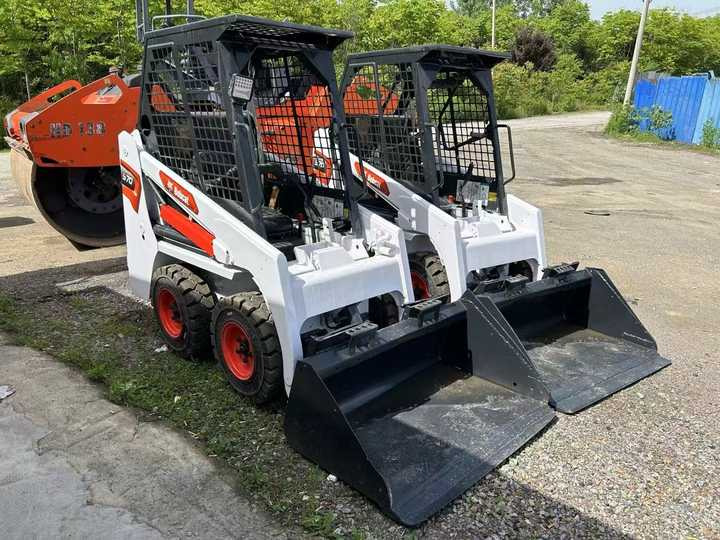 Used Bobcat S70 Skid Teer in Stock Good Condition bobcat S70 S160 185 300 330 Skid Steer for Sale - Mini homlokrakodó: 3 kép. Used Bobcat S70 Skid Teer in Stock Good Condition bobcat S70 S160 185 300 330 Skid Steer for Sale - Mini homlokrakodó: 3 kép.
