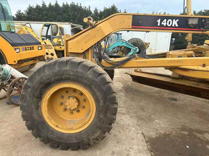 Used CAT 140K Land Road Motor Graer CAT140k Used Grader Cheap Price for Sale - Gréder: 4 kép. Used CAT 140K Land Road Motor Graer CAT140k Used Grader Cheap Price for Sale - Gréder: 4 kép.