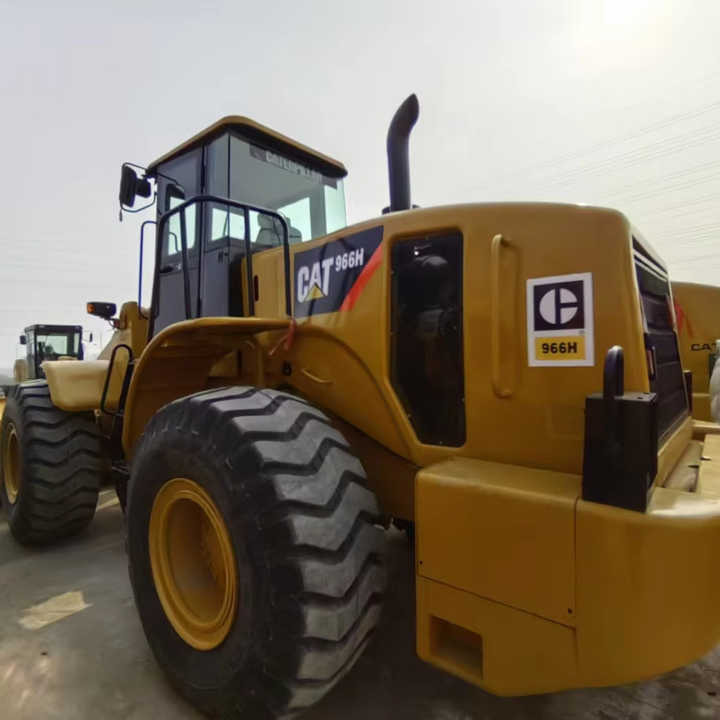Used CAT 966h Wheel Loader Original Cheap Used Wheel Loader CAT 950 966 Wheel Loaders for Sale - Gumikerekes homlokrakodó: 1 kép. Used CAT 966h Wheel Loader Original Cheap Used Wheel Loader CAT 950 966 Wheel Loaders for Sale - Gumikerekes homlokrakodó: 1 kép.