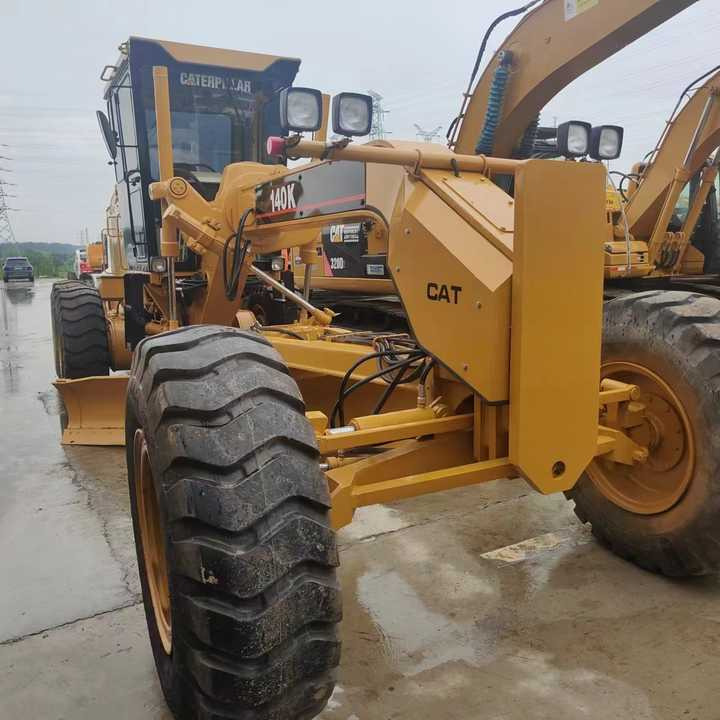 Used Cat 140K New Model Grader Popular Brand Japan Cat Hydraulic Machinery Construction Equipment - Gréder: 4 kép. Used Cat 140K New Model Grader Popular Brand Japan Cat Hydraulic Machinery Construction Equipment - Gréder: 4 kép.