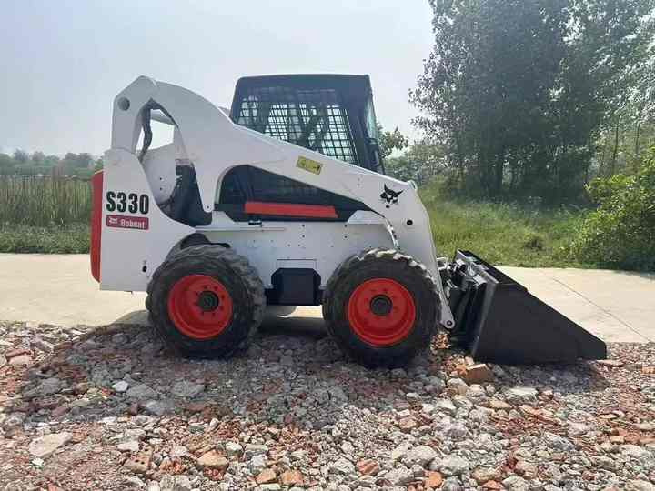 Used Heavy Construction Equipment bobcat S330 Second Hand Skid Steers Used Machine Hot Sale - Mini homlokrakodó: 5 kép. Used Heavy Construction Equipment bobcat S330 Second Hand Skid Steers Used Machine Hot Sale - Mini homlokrakodó: 5 kép.