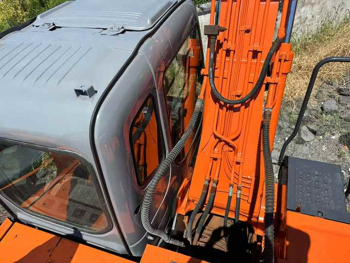 Used Wheel Excavator Hitachi ZX 130W Made in Japan 13tonHitachi Zx130w Wheel Excavator Price Used Hitachi Zx130 Excavator SALE - Kotrógép: 5 kép. Used Wheel Excavator Hitachi ZX 130W Made in Japan 13tonHitachi Zx130w Wheel Excavator Price Used Hitachi Zx130 Excavator SALE - Kotrógép: 5 kép.