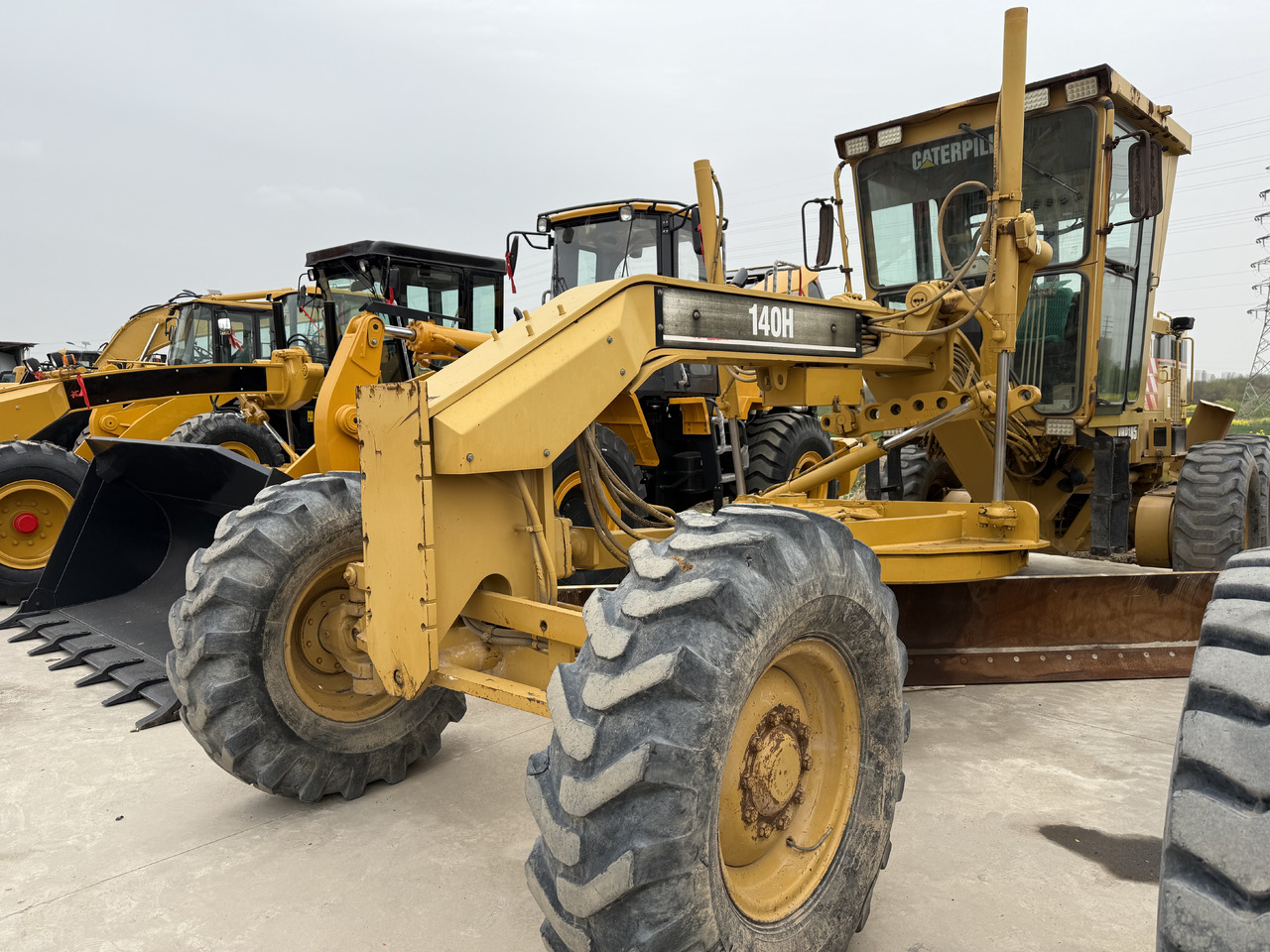 CATERPILLAR 140H - Gréder: 3 kép. CATERPILLAR 140H - Gréder: 3 kép.