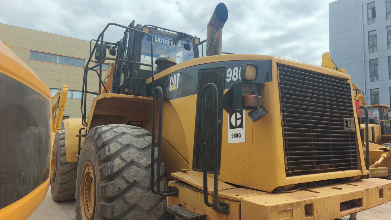 CATERPILLAR 980G - Gumikerekes homlokrakodó: 4 kép. CATERPILLAR 980G - Gumikerekes homlokrakodó: 4 kép.