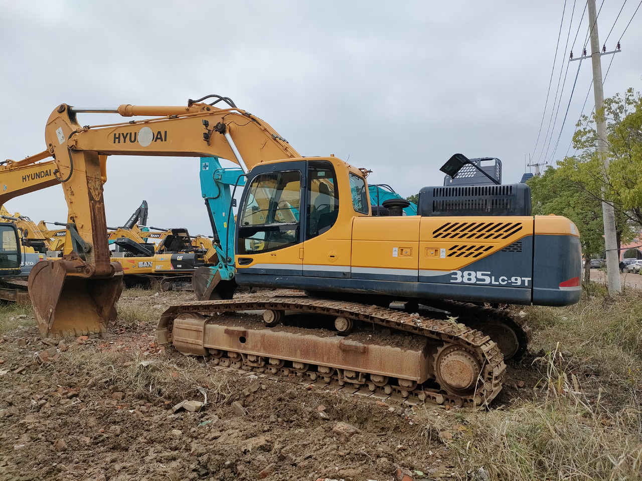 HYUNDAI R385LC-9T - Lánctalpas kotró: 1 kép. HYUNDAI R385LC-9T - Lánctalpas kotró: 1 kép.