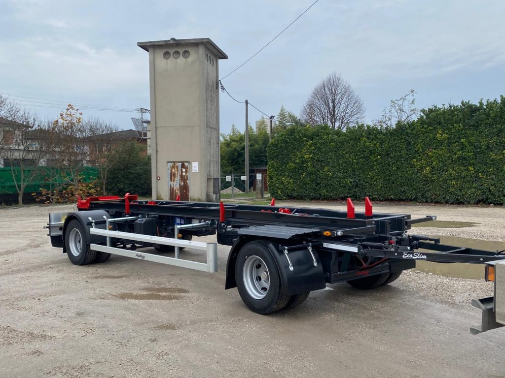 AUSTERAS RIMORCHIO NUOVO AUSTERAS SCARRABILE PNEUMATICO - Multiliftes/ Konténerszállító pótkocsi: 1 kép. AUSTERAS RIMORCHIO NUOVO AUSTERAS SCARRABILE PNEUMATICO - Multiliftes/ Konténerszállító pótkocsi: 1 kép.