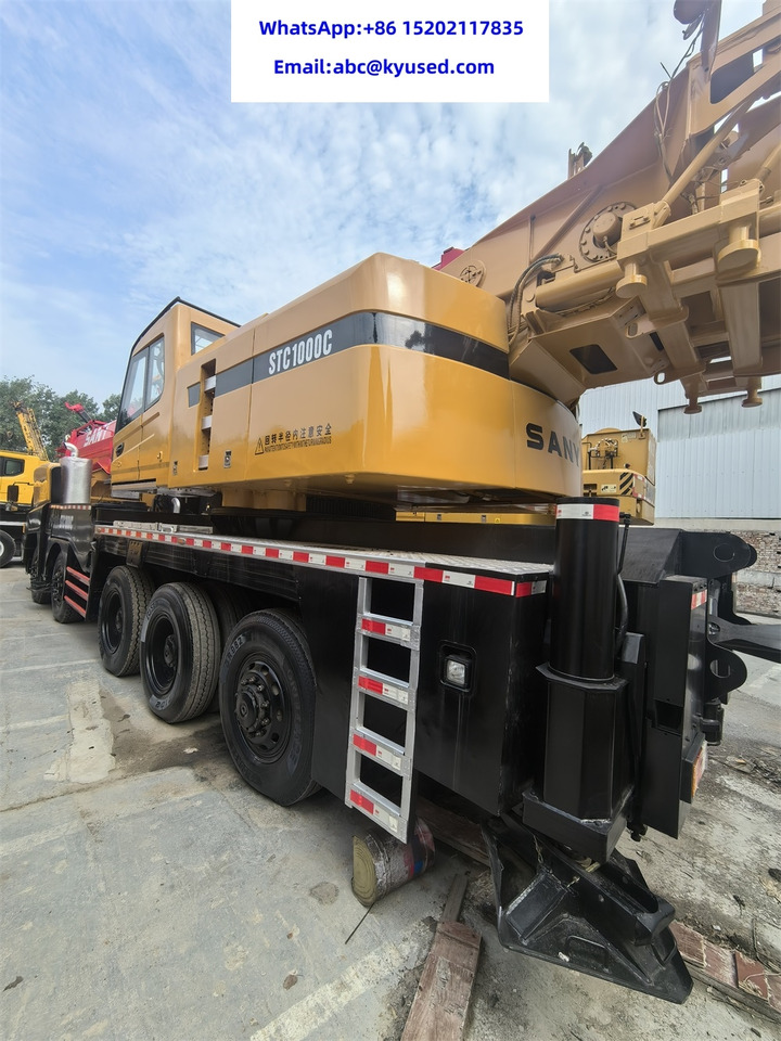 SANY STC1000 STC1000C STC1000C6 100Ton truck crane - Autódaru: 4 kép. SANY STC1000 STC1000C STC1000C6 100Ton truck crane - Autódaru: 4 kép.