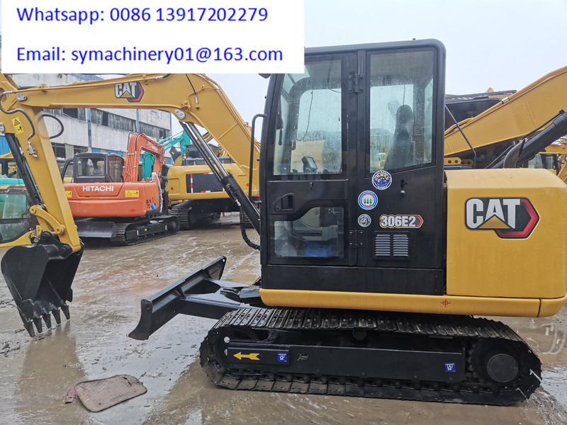 Caterpillar 306E2 - Minikotró: 1 kép. Caterpillar 306E2 - Minikotró: 1 kép.