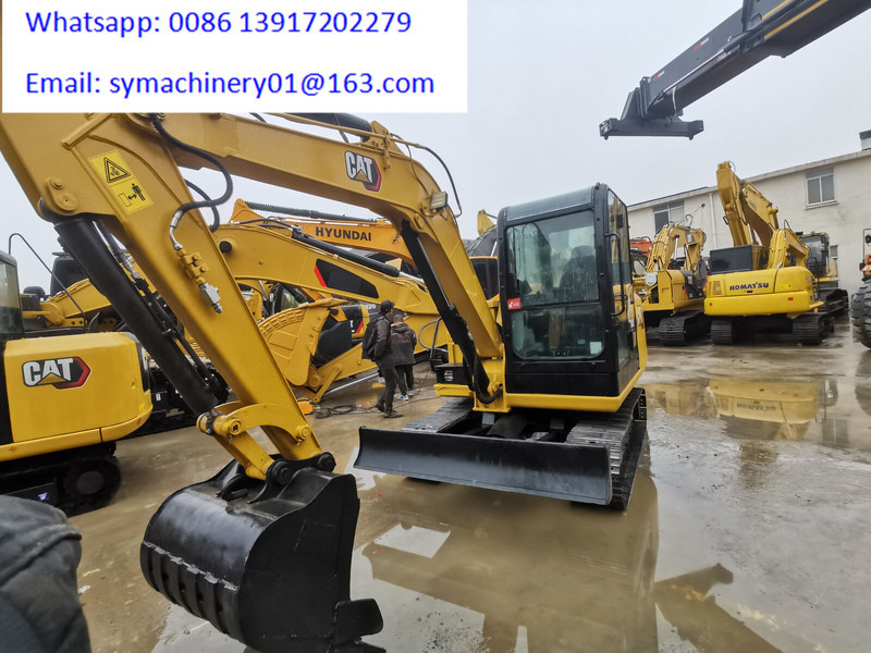 Caterpillar 306E2 - Minikotró: 2 kép. Caterpillar 306E2 - Minikotró: 2 kép.