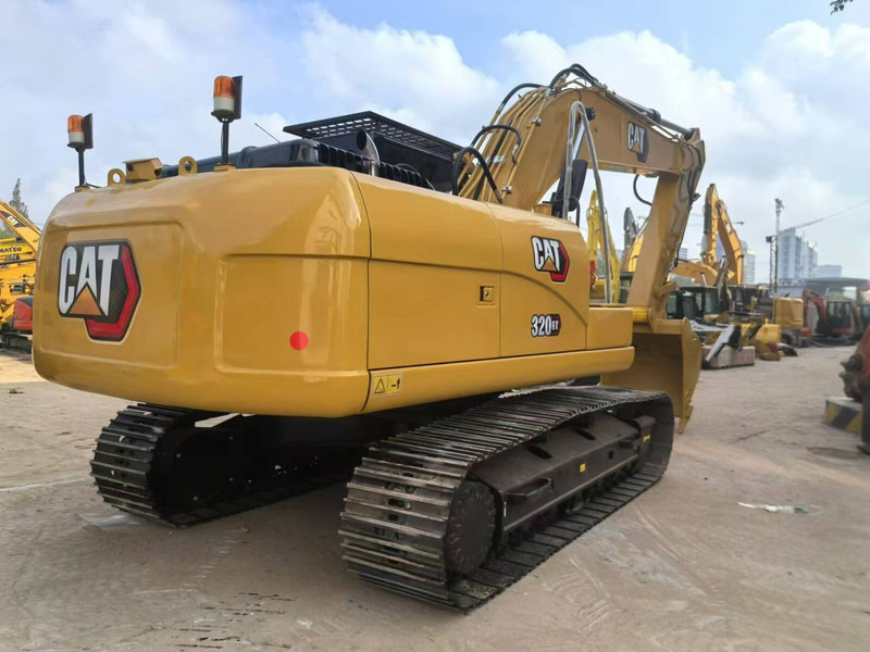 Caterpillar 320GX - Lánctalpas kotró: 1 kép. Caterpillar 320GX - Lánctalpas kotró: 1 kép.