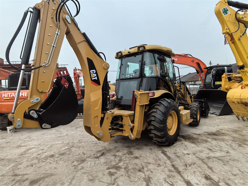 Caterpillar 420F2 420F 420 430F - Kotrórakodó: 2 kép. Caterpillar 420F2 420F 420 430F - Kotrórakodó: 2 kép.