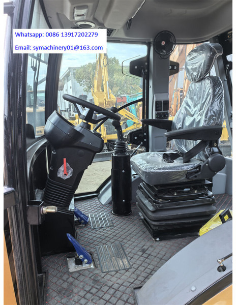 Caterpillar 430F2 - Kotrórakodó: 4 kép. Caterpillar 430F2 - Kotrórakodó: 4 kép.