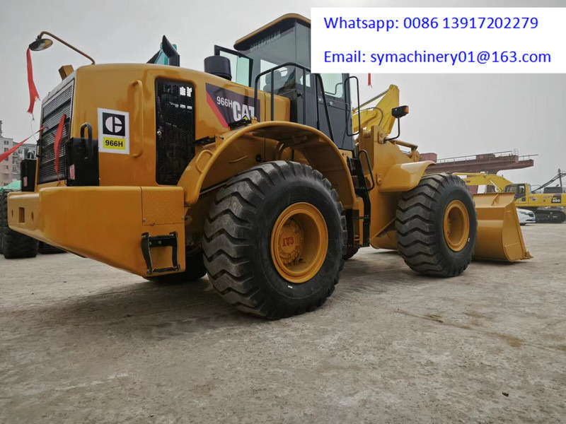 Caterpillar 966H - Gumikerekes homlokrakodó: 2 kép. Caterpillar 966H - Gumikerekes homlokrakodó: 2 kép.