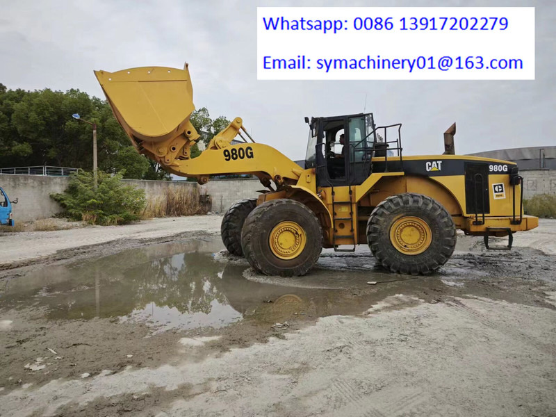 Caterpillar 980G - Gumikerekes homlokrakodó: 2 kép. Caterpillar 980G - Gumikerekes homlokrakodó: 2 kép.