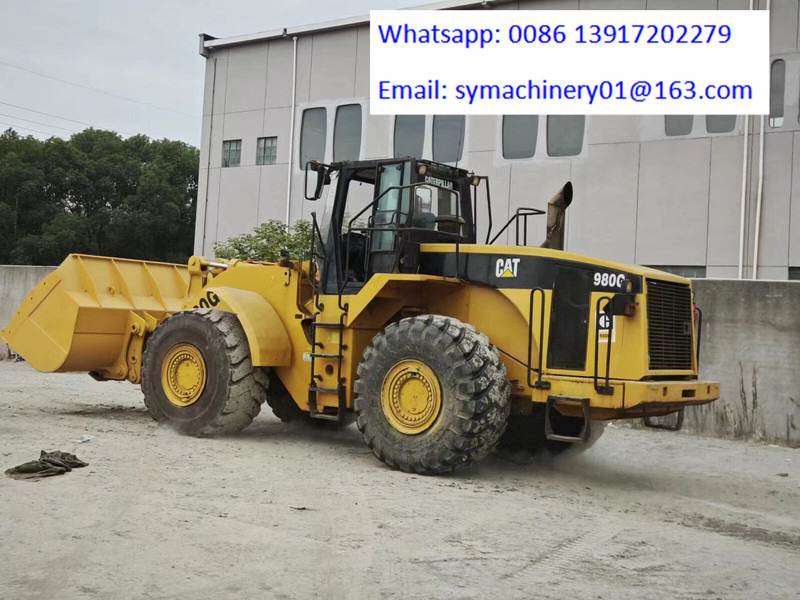Caterpillar 980G - Gumikerekes homlokrakodó: 4 kép. Caterpillar 980G - Gumikerekes homlokrakodó: 4 kép.