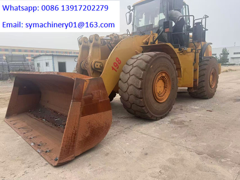 Caterpillar 980H - Gumikerekes homlokrakodó: 1 kép. Caterpillar 980H - Gumikerekes homlokrakodó: 1 kép.