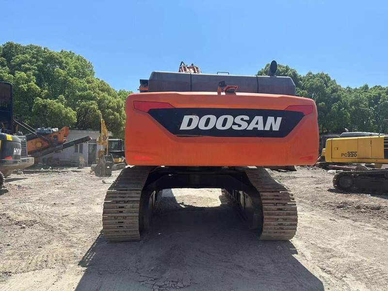 Doosan DX530 - Lánctalpas kotró: 3 kép. Doosan DX530 - Lánctalpas kotró: 3 kép.