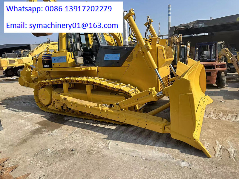 Komatsu D155A-5 - Buldózer: 1 kép. Komatsu D155A-5 - Buldózer: 1 kép.