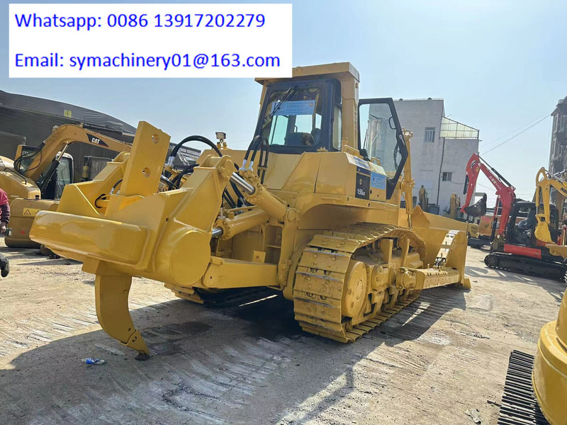 Komatsu D155A-5 - Buldózer: 4 kép. Komatsu D155A-5 - Buldózer: 4 kép.