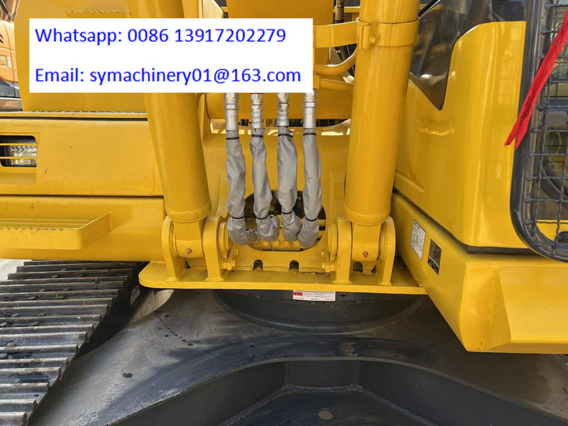 Komatsu PC130 - Lánctalpas kotró: 4 kép. Komatsu PC130 - Lánctalpas kotró: 4 kép.