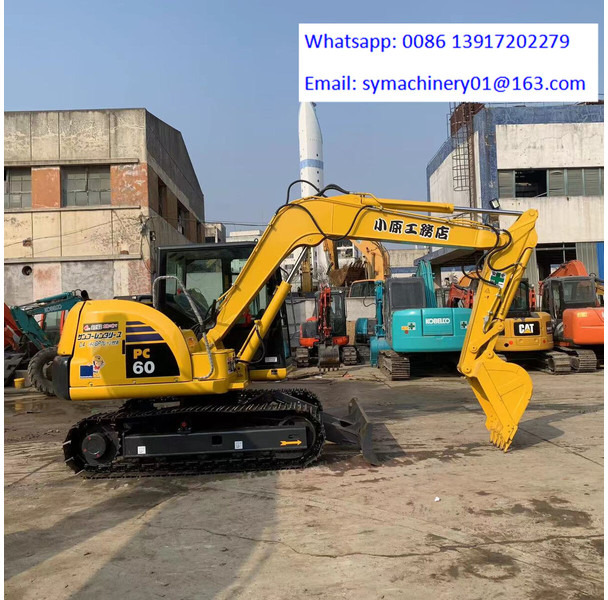 Komatsu PC60-8 - Minikotró: 4 kép. Komatsu PC60-8 - Minikotró: 4 kép.