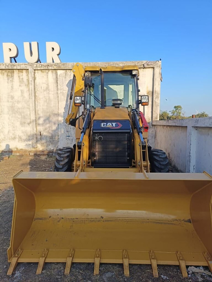 New Caterpillar 424 backhoe loader - Kotrórakodó: 1 kép. New Caterpillar 424 backhoe loader - Kotrórakodó: 1 kép.