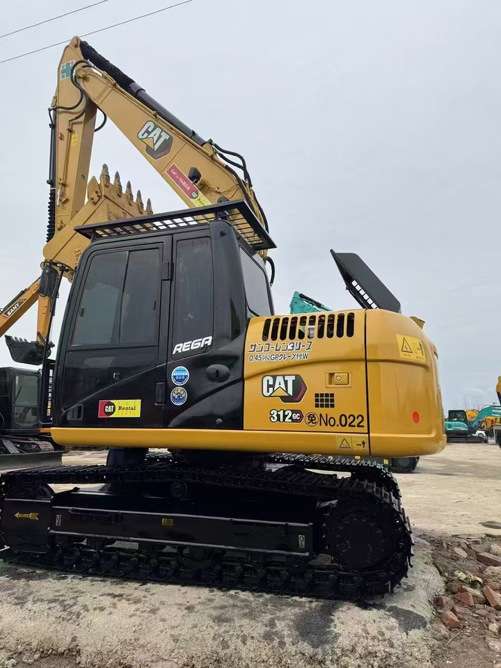 CAT 312D - Lánctalpas kotró: 4 kép. CAT 312D - Lánctalpas kotró: 4 kép.