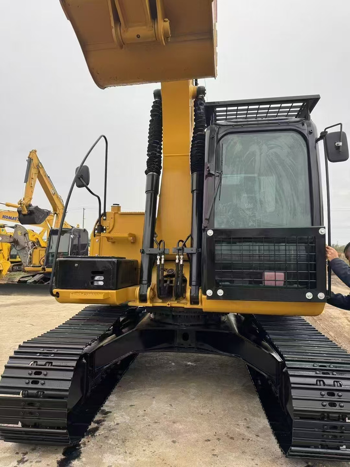 CAT 312D - Lánctalpas kotró: 1 kép. CAT 312D - Lánctalpas kotró: 1 kép.