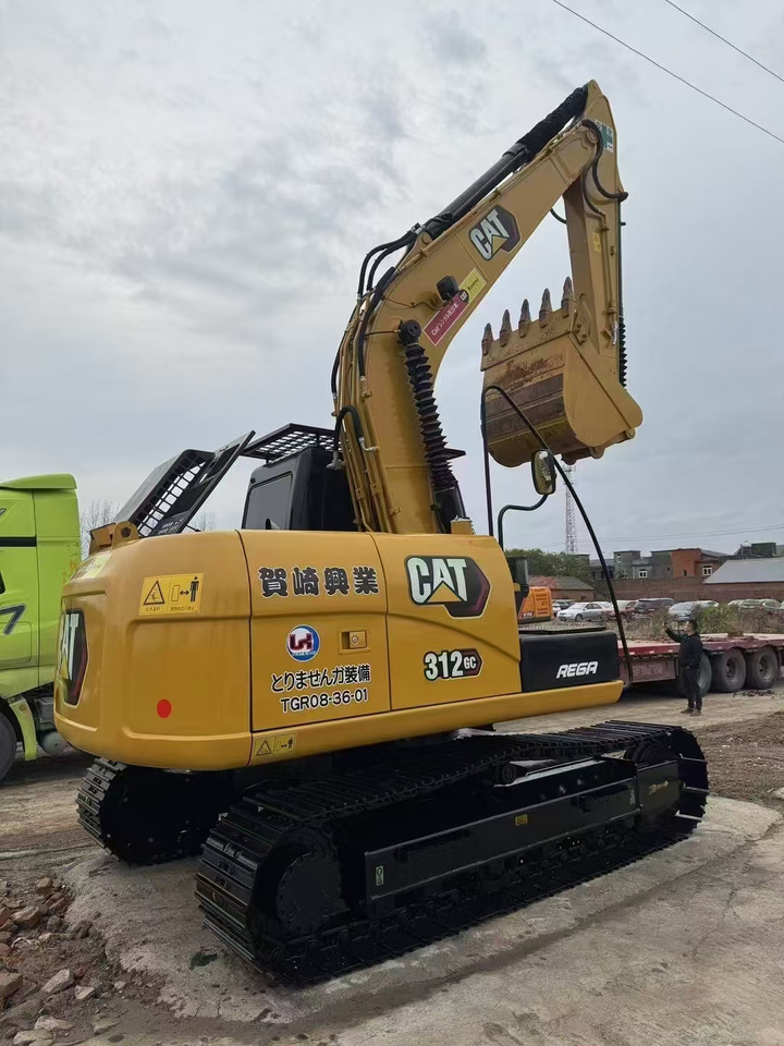 CAT 312D - Lánctalpas kotró: 2 kép. CAT 312D - Lánctalpas kotró: 2 kép.