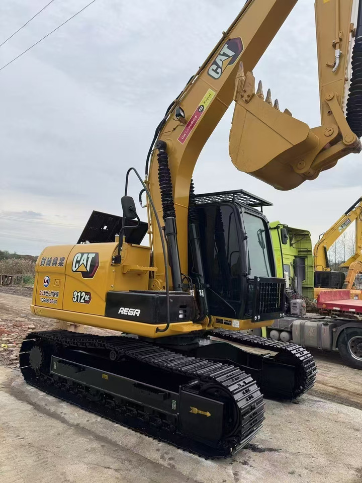 CAT 312D - Lánctalpas kotró: 3 kép. CAT 312D - Lánctalpas kotró: 3 kép.