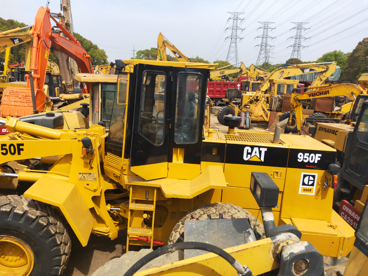CATERPILLAR Wheel Loader  950F Click Here for Discount - Gumikerekes homlokrakodó: 4 kép. CATERPILLAR Wheel Loader  950F Click Here for Discount - Gumikerekes homlokrakodó: 4 kép.