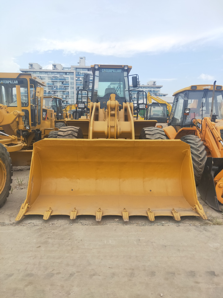 CATERPILLAR Wheel Loader 950G Click Here for Discount - Gumikerekes homlokrakodó: 2 kép. CATERPILLAR Wheel Loader 950G Click Here for Discount - Gumikerekes homlokrakodó: 2 kép.