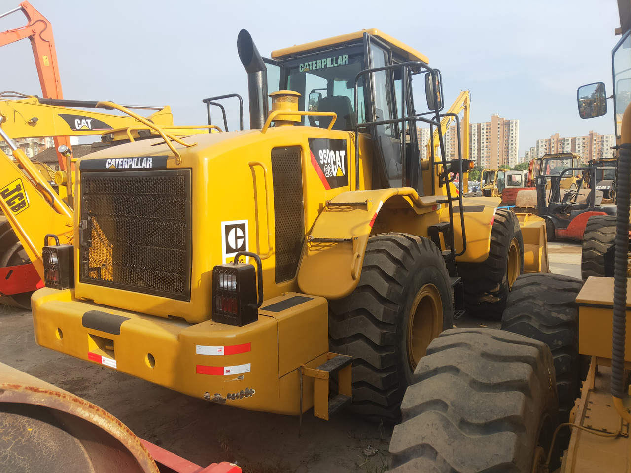 CATERPILLAR Wheel Loader 950G Click Here for Discount - Gumikerekes homlokrakodó: 3 kép. CATERPILLAR Wheel Loader 950G Click Here for Discount - Gumikerekes homlokrakodó: 3 kép.