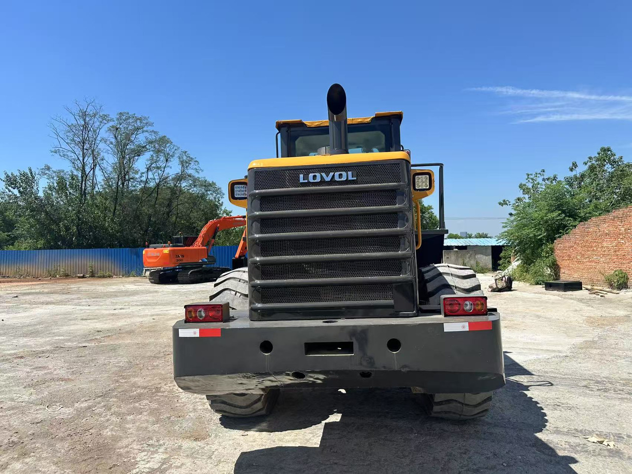 LOVOL FL956H Wheel Loader Click Here for Discount - Gumikerekes homlokrakodó: 5 kép. LOVOL FL956H Wheel Loader Click Here for Discount - Gumikerekes homlokrakodó: 5 kép.