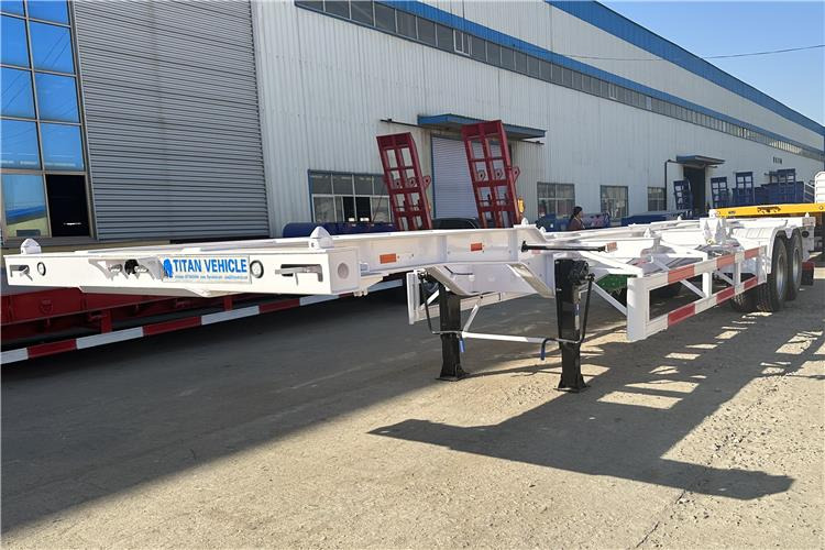 TITAN 2 Axle 40ft Container Transport Trailer for Sale In Nigeria - Félpótkocsi alváz: 1 kép. TITAN 2 Axle 40ft Container Transport Trailer for Sale In Nigeria - Félpótkocsi alváz: 1 kép.