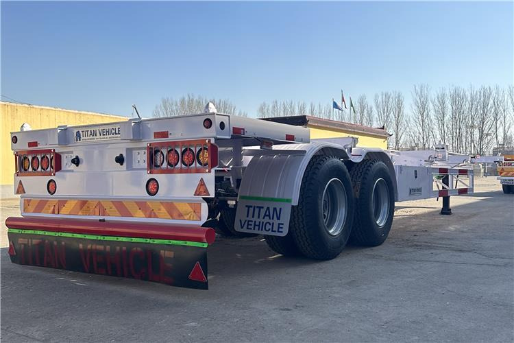 TITAN 2 Axle 40ft Container Transport Trailer for Sale In Nigeria - Félpótkocsi alváz: 5 kép. TITAN 2 Axle 40ft Container Transport Trailer for Sale In Nigeria - Félpótkocsi alváz: 5 kép.