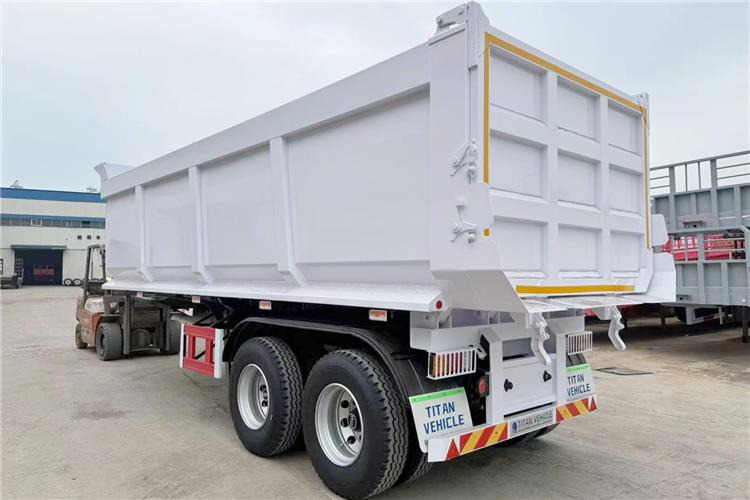 TITAN 2 Axle Dump Semi Trailer for Sale In Tanzania - Félpótkocsi billenőplatós: 2 kép. TITAN 2 Axle Dump Semi Trailer for Sale In Tanzania - Félpótkocsi billenőplatós: 2 kép.